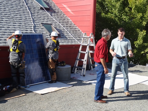 Ross Trethewey talks with homeowner about his Luminalt solar installation